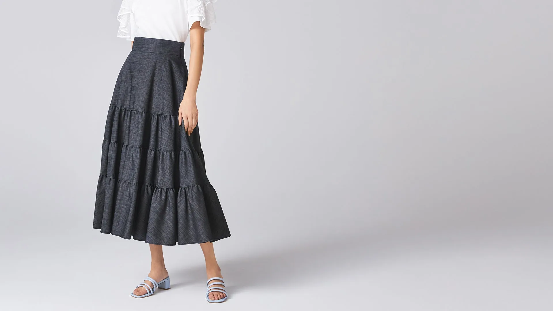 Sure! A more optimized title for the Indigo Hanabi Skirt could be:

Elegant Indigo Hanabi Skirt - Flowy Summer Maxi Skirt with Floral Design

Feel free to let me know if there are specific features or styles youd like to highlight further!